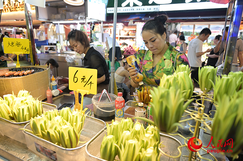 酸辣可口的“芒果花”。人民網(wǎng) 雷琦竣攝